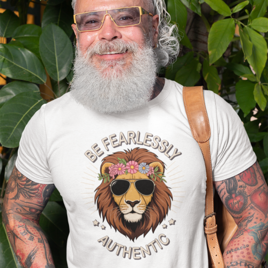 Trippy Outfitters - "Be Fearlessly Authentic" T-Shirt design featuring a confident lion wearing stylish sunglasses and a colorful flower crown. The empowering text "Be Fearlessly Authentic" encourages self-assurance and individuality. Made from soft, premium fabric, this inspiring tee celebrates bold, unapologetic authenticity.